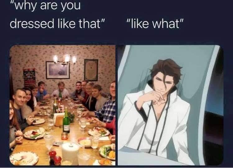 The meme is a humorous comparison between a group of people dressed in elaborate, historical costumes at a dinner table and the anime character Light Yagami from the series "Death Note". The text at the top reads "Why are you dressed like that?" and the text at the bottom reads "I like what I'm wearing."